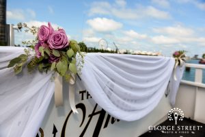 Pink roses and green foliage on the Anita Dee yacht charter in Chicago.