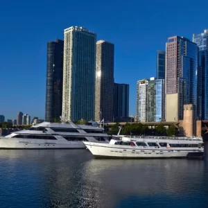 Chicago yacht charters Anita Dee I and Anita Dee II on the water against the skyline.